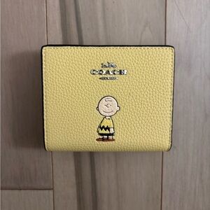 Coach Yellow Kids Wallet with Charlie Brown Design